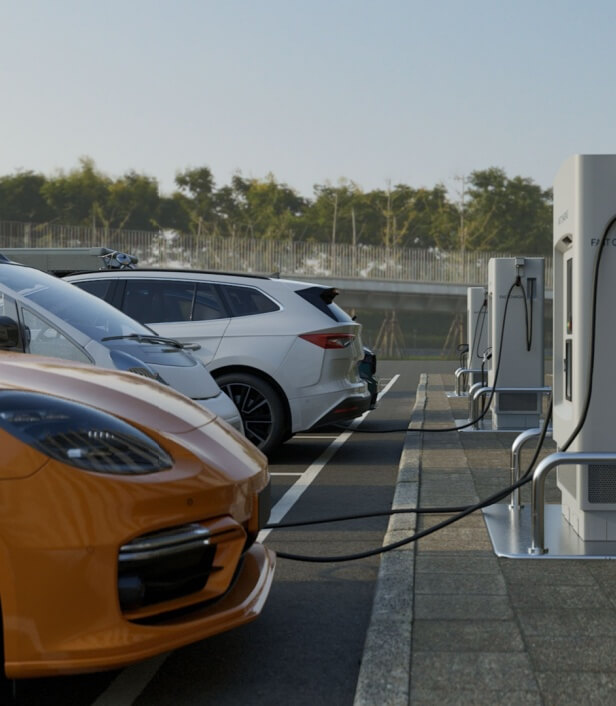 EVs charging in a parking lot